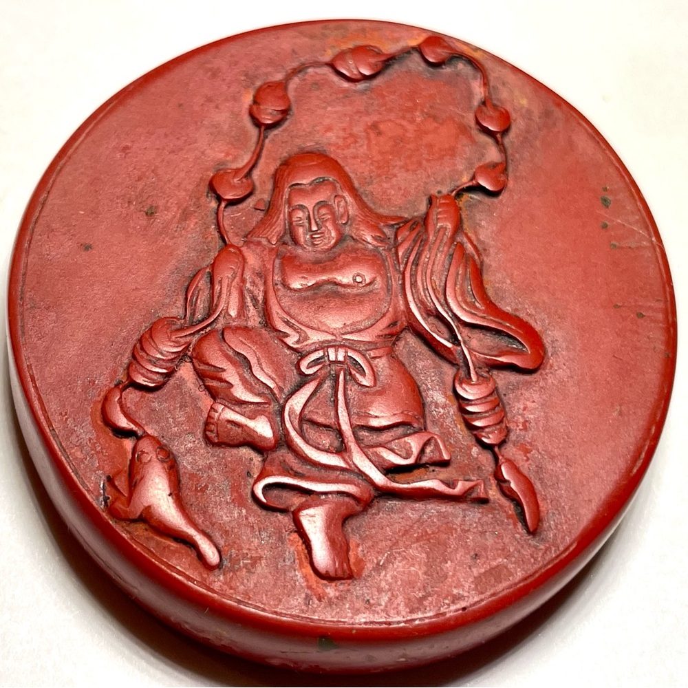 Elegant Red Buddha Sculpture